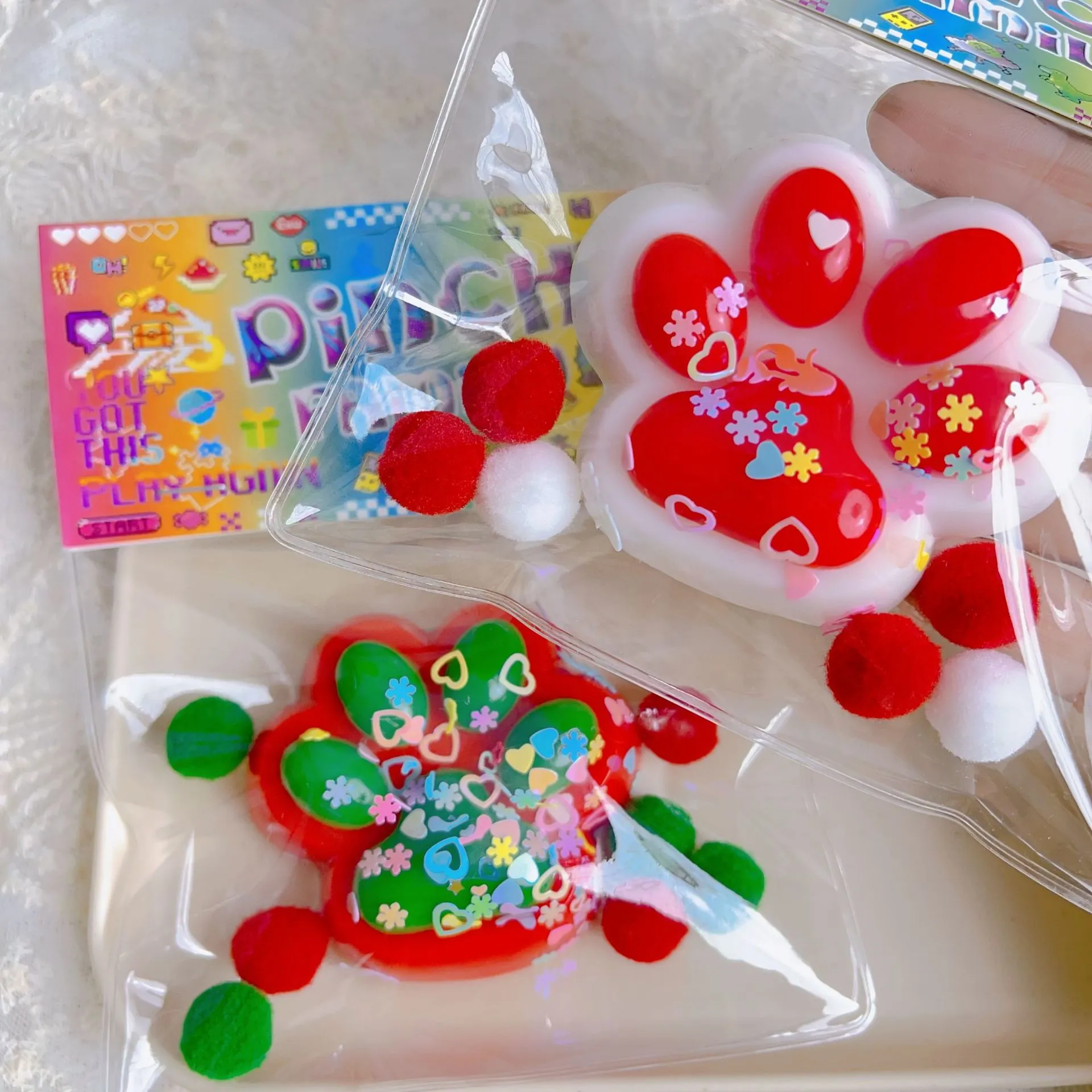 Weihnachten Katzenpfote Squishy Spielzeug Weiches TPR Stressabbau Quetschspielzeug Mit Pailletten Und Flauschigem Ball Für Kinder Erwachsene