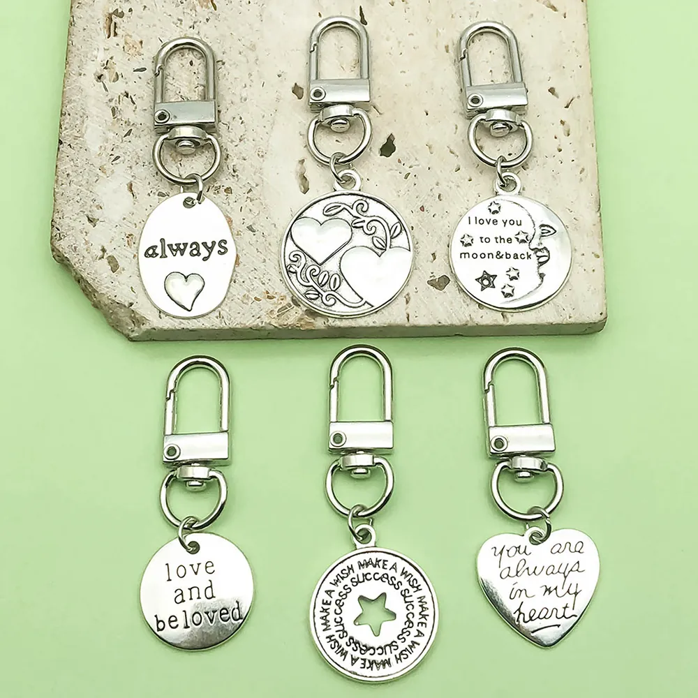 Inspirierende Zitate Antiksilber Legierung Schlüsselanhänger Herz Stern Mond Brief Anhänger Tasche Charme Kreatives Geschenk Modeschlüsselring