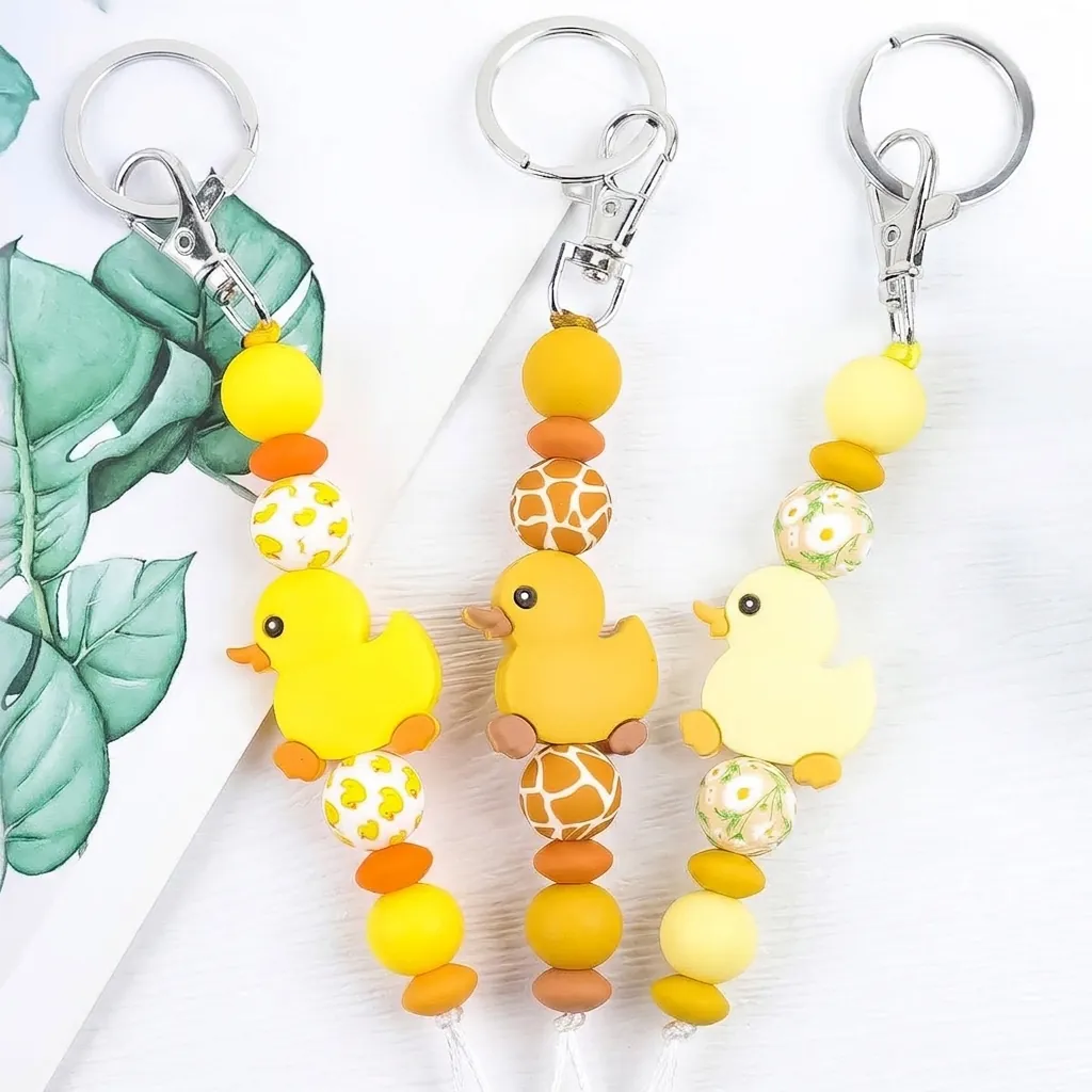 Amerikanischer Stil Süßer Silikon Gelbe Ente Schlüsselanhänger Für Kinder Weihnachten Geschenk Cartoon Tier Perle Taschenanhänger Schlüsselring Schmuck