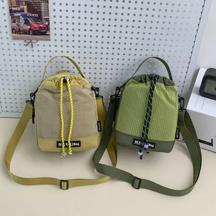 Trendy Nylon Drawstring Crossbody Bag Large Capacity Water Cup Bag Portable Casual Travel Backpack With Cute Cloud Pendant