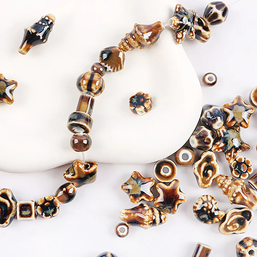 Cuentas de Cerámica Marrón Vintage Formas Surtidas Caracola Estrella para Creación de Joyas DIY Pulsera Collar Accesorios