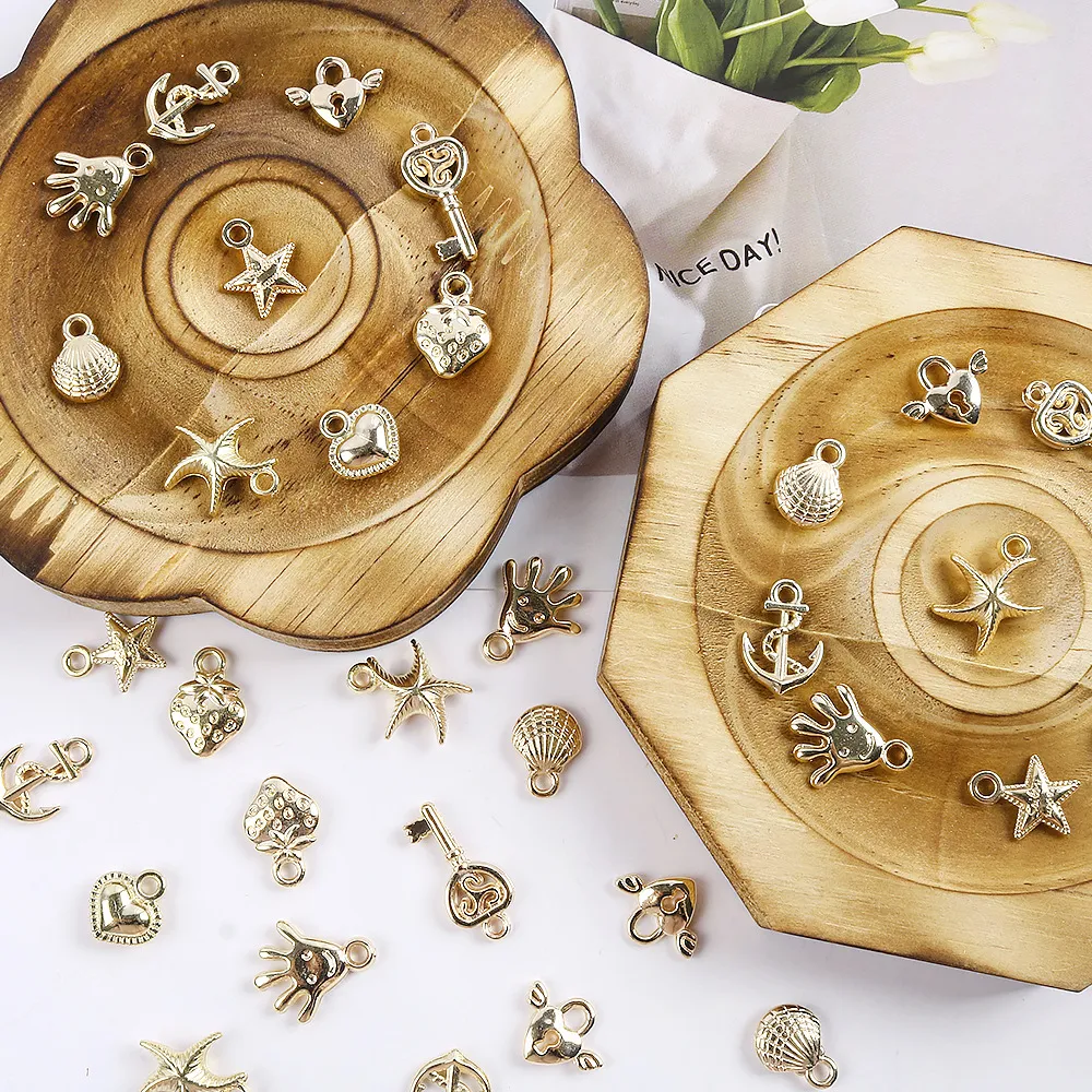 Or Style Océan Alliage Plastique Coquillage Étoile de Mer Cœur DIY Breloques Pendentifs Pour Accessoires de Bijoux Fait Main