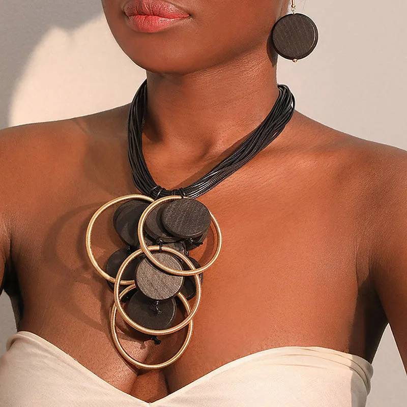 Set Gioielli Donna Collana Multistrato in Cordino Cerato Con Ciondolo a Cerchio in Lega e Disco di Legno Orecchini Boho