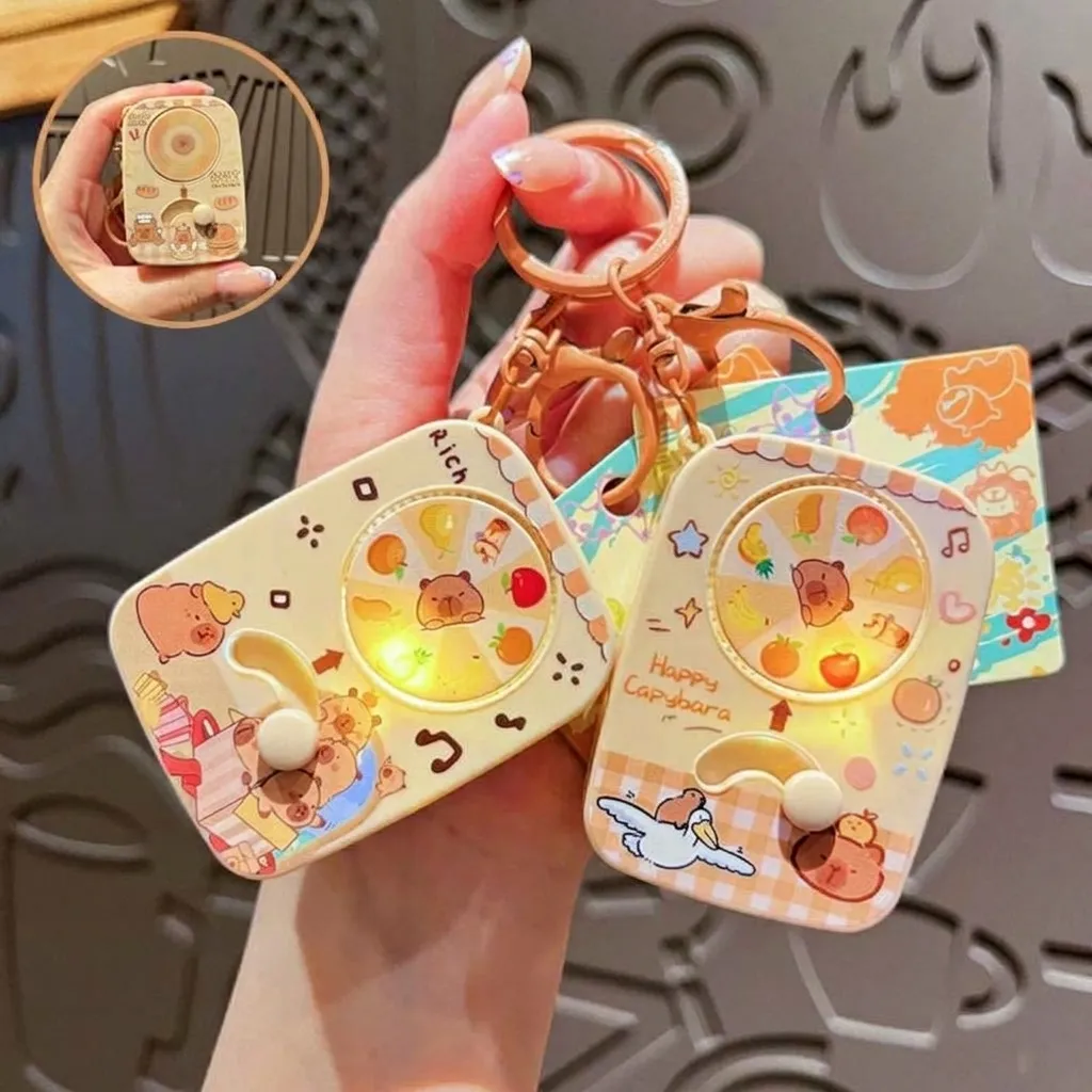 Cartoon Capybara Spinning Keychain LED Light Up Interactive Stress Relief Toy PVC Bag Charm Pendant Gift For Kids Unisex