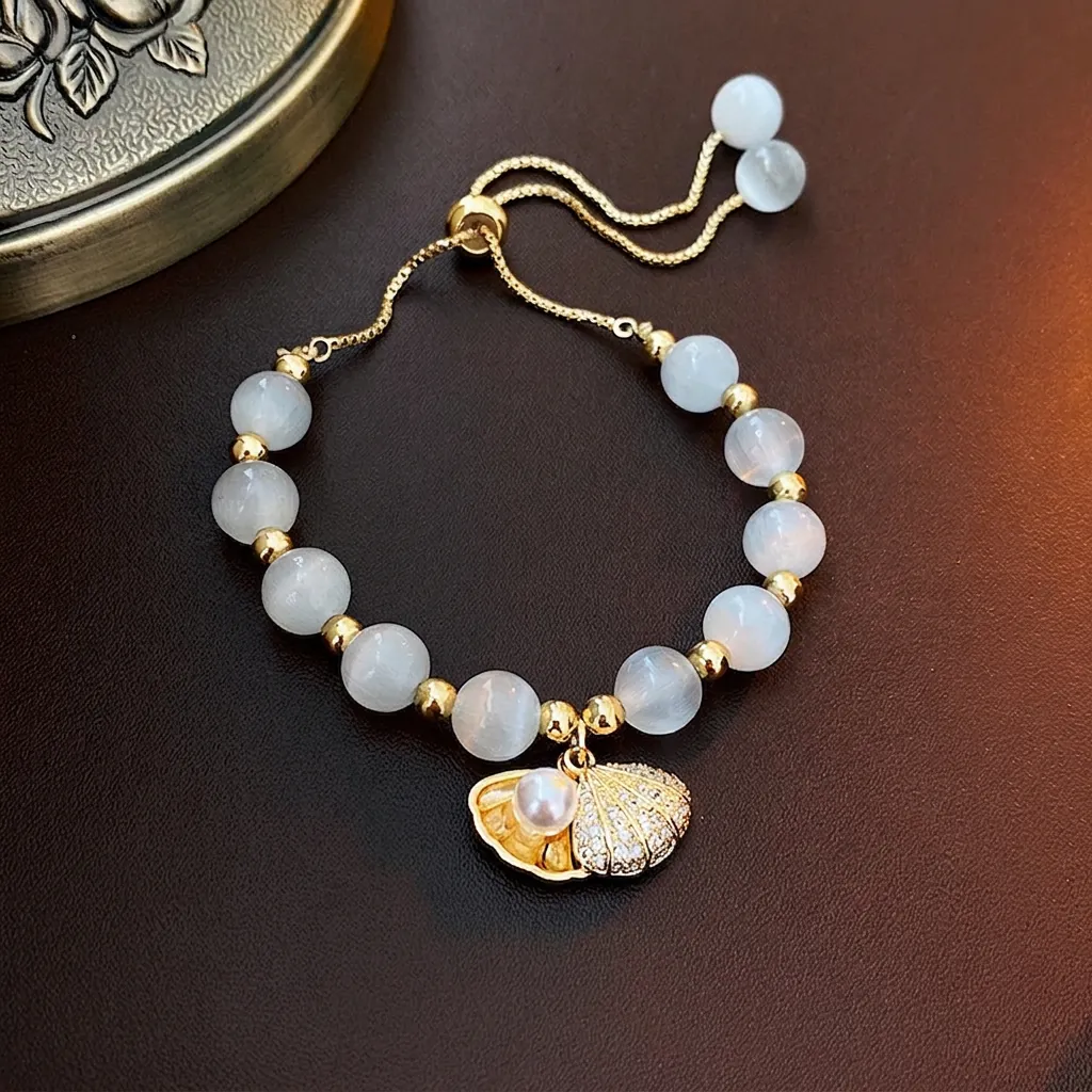 Bracelet Künstliche Perles Oeil De Chat Avec Pendentif Coquillage Künstliche Perle Cuivre Plaqué Or Bijoux Elégants Pour Femmes