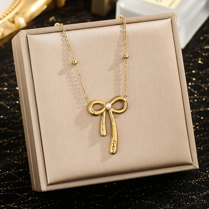 Collier Pendentif Nœud Élégant Acier Inoxydable Imitation Künstliche Perle Chaîne À Billes Bijoux Dorés Haut De Gamme Pour Femmes