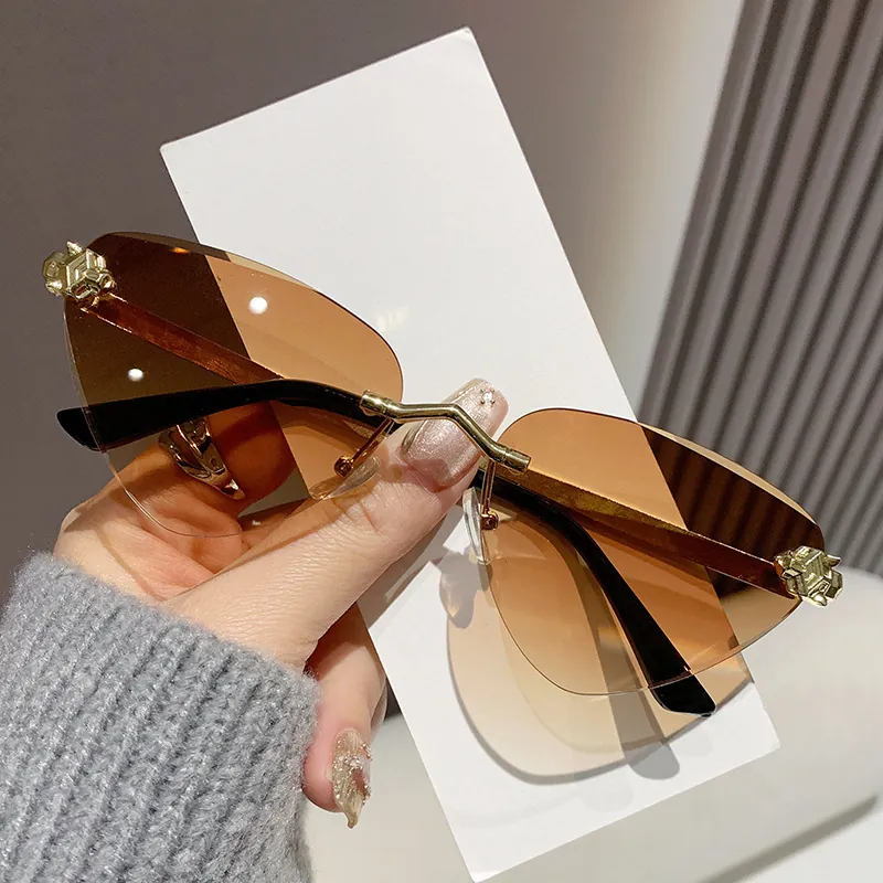 Rimless Cat Eye Sunglasses For Women Retro Gradient Metal Frame UV400 Fashion Trendy Eyewear Panther Head Detail