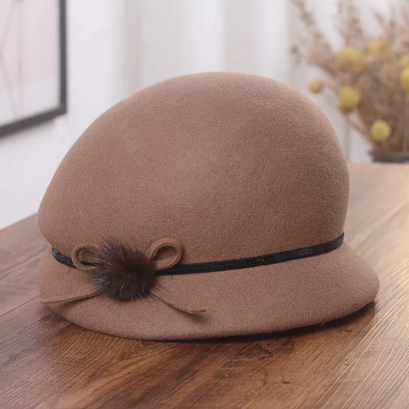 Chapeau Cloche Vintage Élégant en Feutre de Laine pour Femmes Style Hepburn Hiver Chaud Avec Nœud et Boule de Fourrure