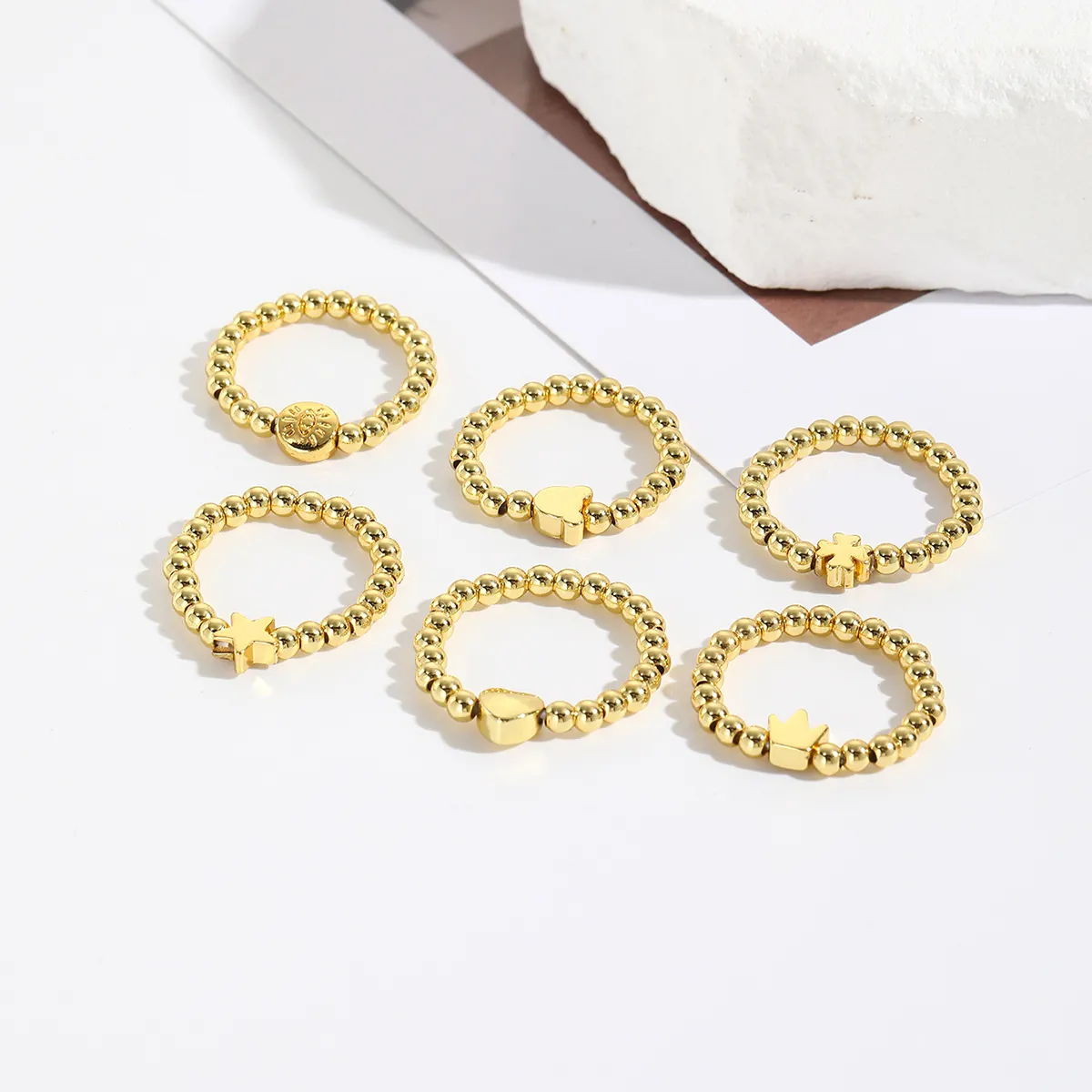 Minimalist Gold Plated Copper Beaded Elastic Rings For Women Stackable Fashion Jewelry Heart Star Crown Clover Eye Cross Charm Ring