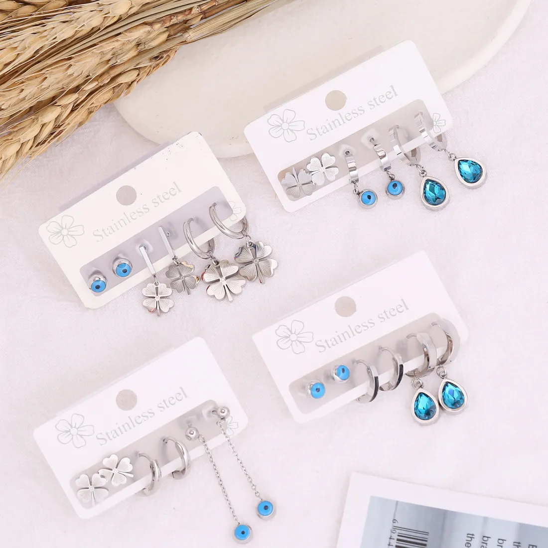 Ensemble de Boucles d'Oreilles en Acier Inoxydable Mauvais Œil Goutte d'Eau Strass pour Femme Clous d'Oreilles Trèfle à Quatre Feuilles Mode