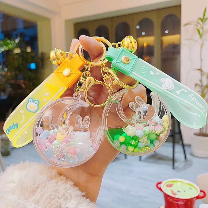 Cute Moon Rabbit Liquid Quicksand Keychain Acrylic Moving Glitter Bag Charm With Silicone Strap Bell Gift