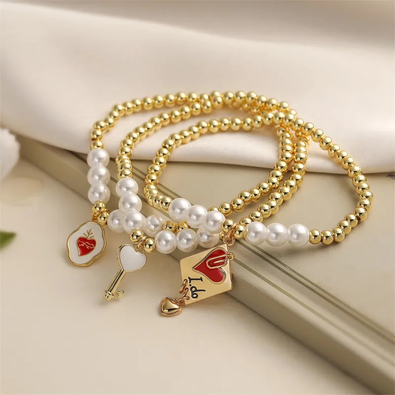 Bracelet Künstliche Perles Cuivre Imitation Künstliche Perle Coeur Clé Enveloppe Pendentif Romantique Élégant Bijoux Mode Cadeau Femmes