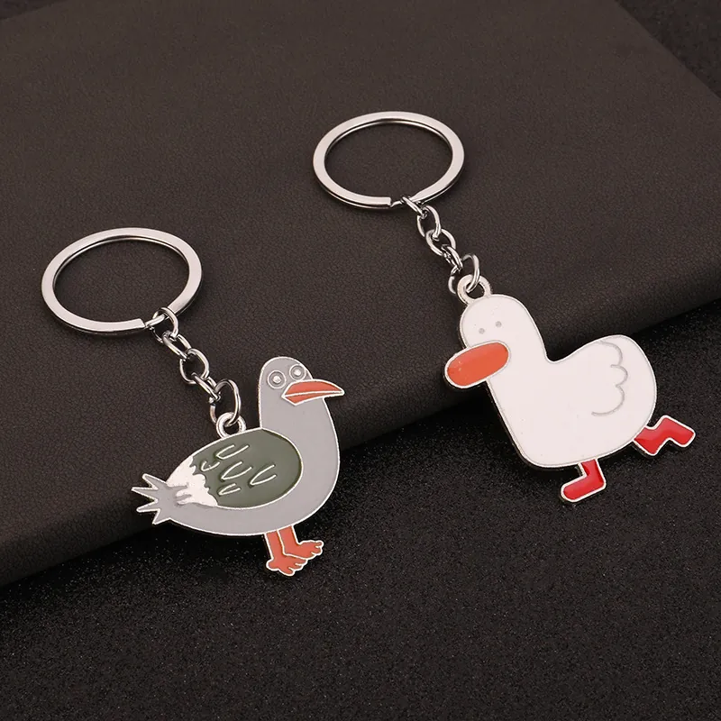 Portachiavi in Lega di Zinco con Animali dei Cartoni Animati Forma di Anatra Piccione Vernice a Forno Portachiavi in Metallo per Zaino