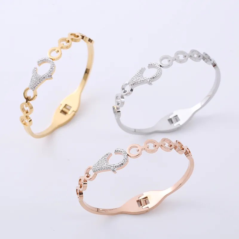 Bracciale Rigido A Cerniera Con Maglie Geometriche Cave In Acciaio Inossidabile 304 E Strass Per Donna Elegante