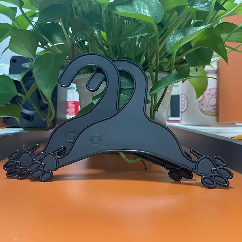 Pet Clothing Hangers Plastic Dog Paw Shape Non Slip For Puppy Cat Clothes Storage Organization