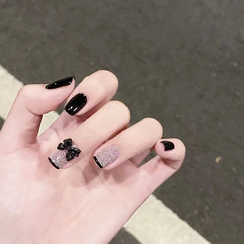 Faux Ongles Press On Noirs Brillants Avec Nœud 3D Et Paillettes Argentées Style Français Manucure