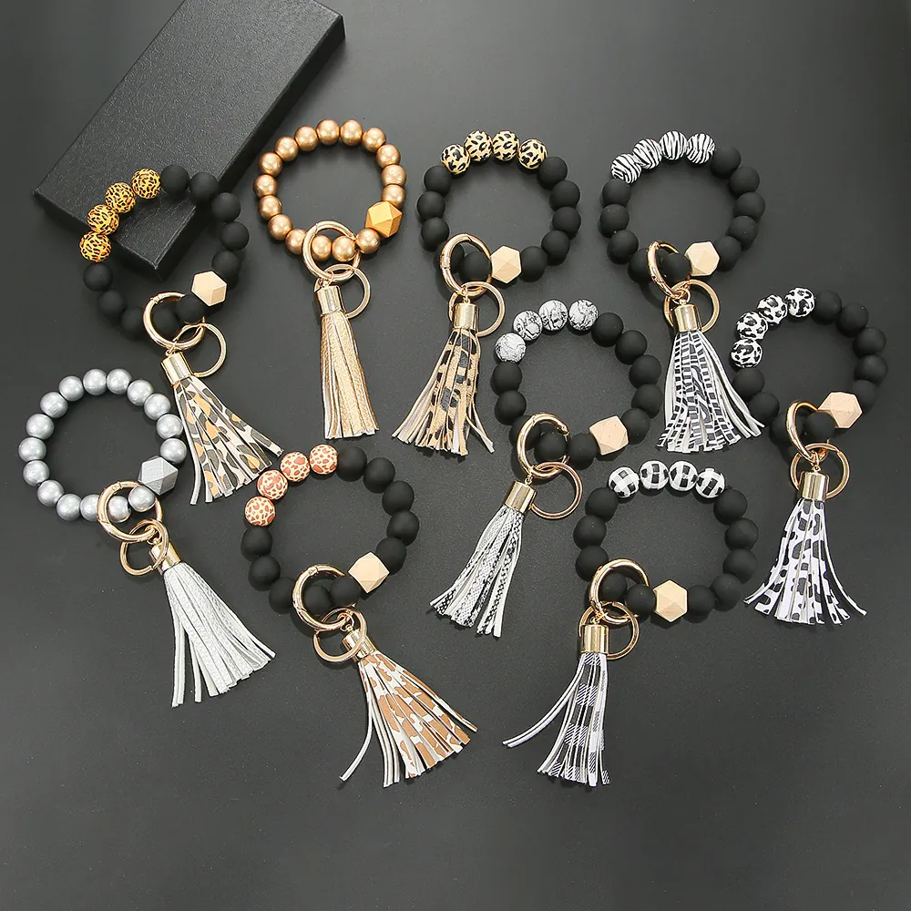 Silicone Beaded Bracelet Keychain Wood Bead PU Leather Tassel Wristlet Bangle Elastic Key Ring Leopard Print