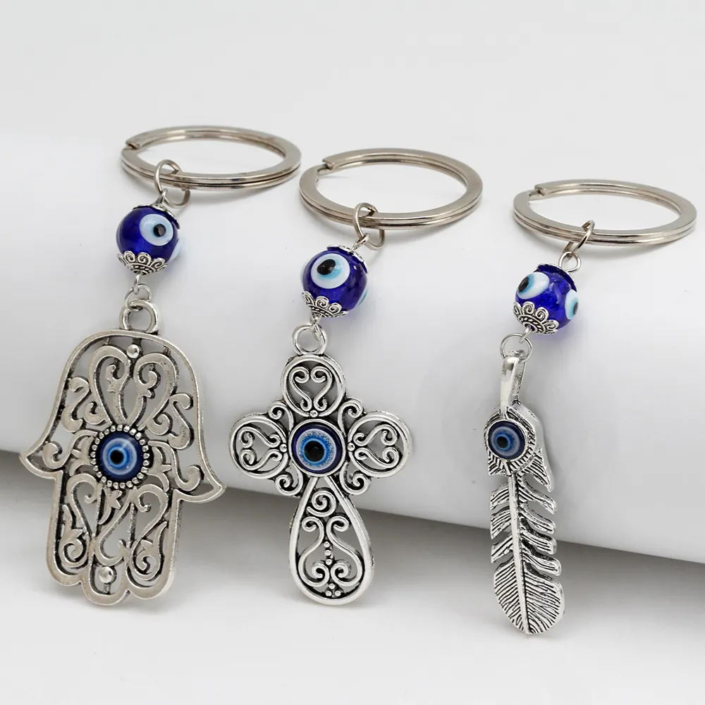 Portachiavi Malocchio Perlina Nazar Blu Mano Di Hamsa Gufo Piuma Croce Luna Sole Amuleto Protezione Lega Zinco Argento