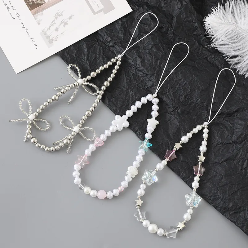 Lanière De Téléphone Perlée Dragonne Künstliche Perle Cristal Nœud Papillon Cœur Étoile Ours Charme Pour Coque De Téléphone