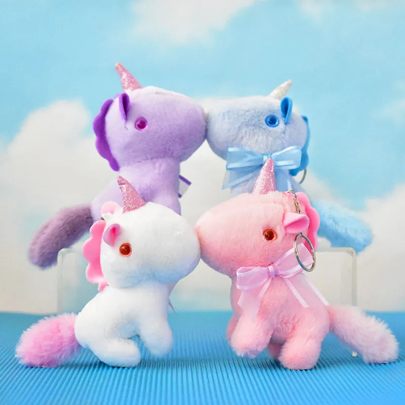 Süßer Plüsch Einhorn Schlüsselanhänger mit Schleife Weiches Stofftier Puppe Spielzeug für Damen Taschenanhänger Kinder Geschenk