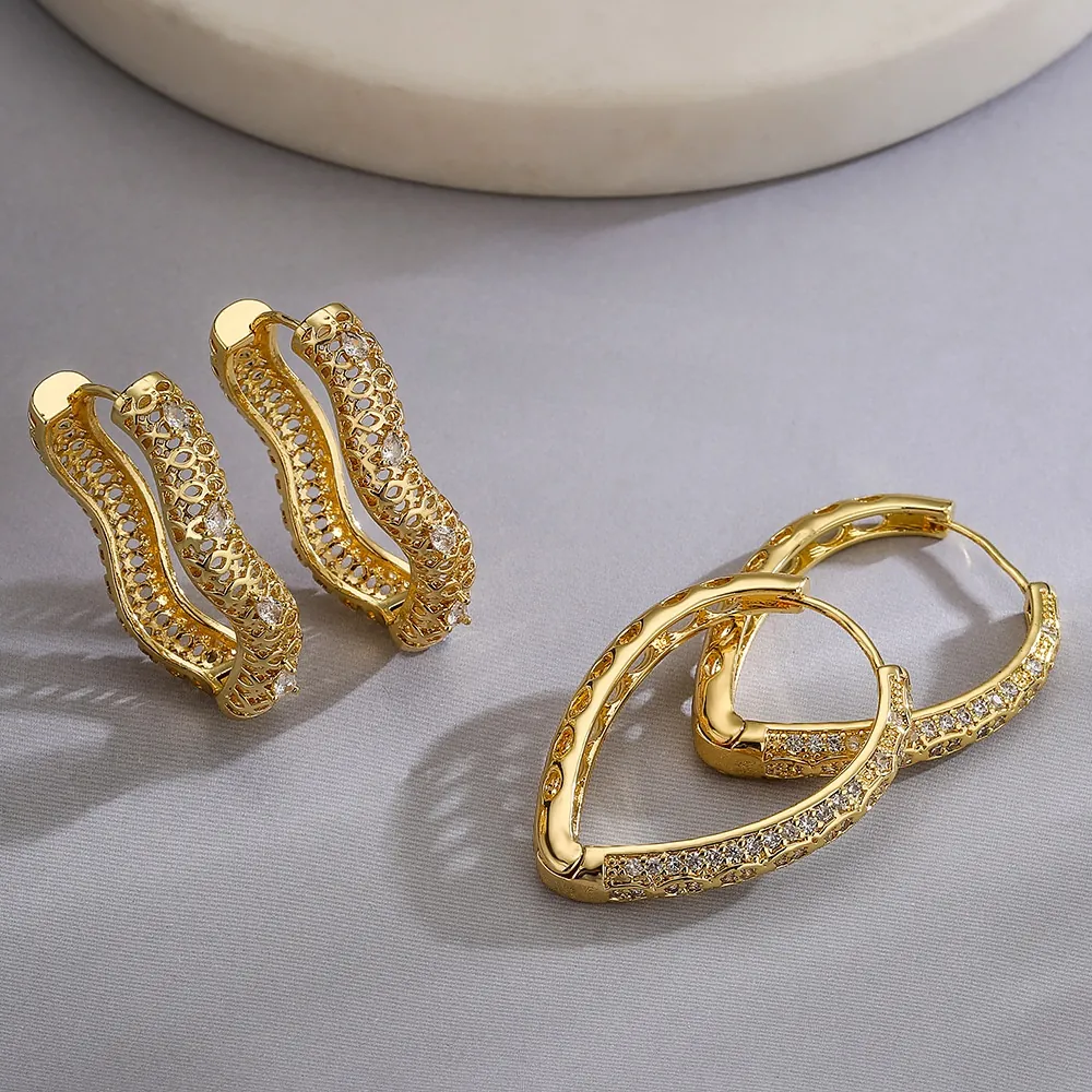 Hohle Creolen Vergoldetes Kupfer Zirkon Wassertropfen Geometrisch Unregelmäßig Schmuck Für Frauen High End Light Luxury
