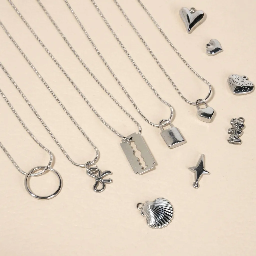 Ciondoli in Acciaio Inossidabile a Forma di Cuore Fiocco Stella Croce DIY Accessori per Gioielli Argento per Collana Donna