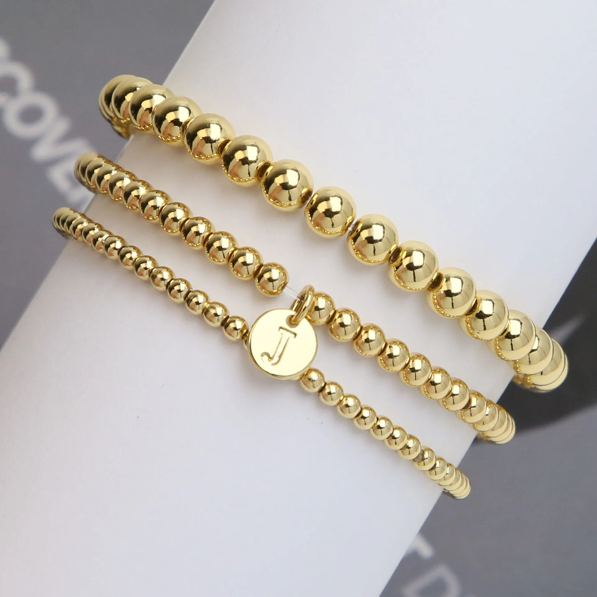 Bracciale a Sfere Oro per Donna Catena Elastica in Rame con Pendente a Disco con Lettera Iniziale Gioielli alla Moda