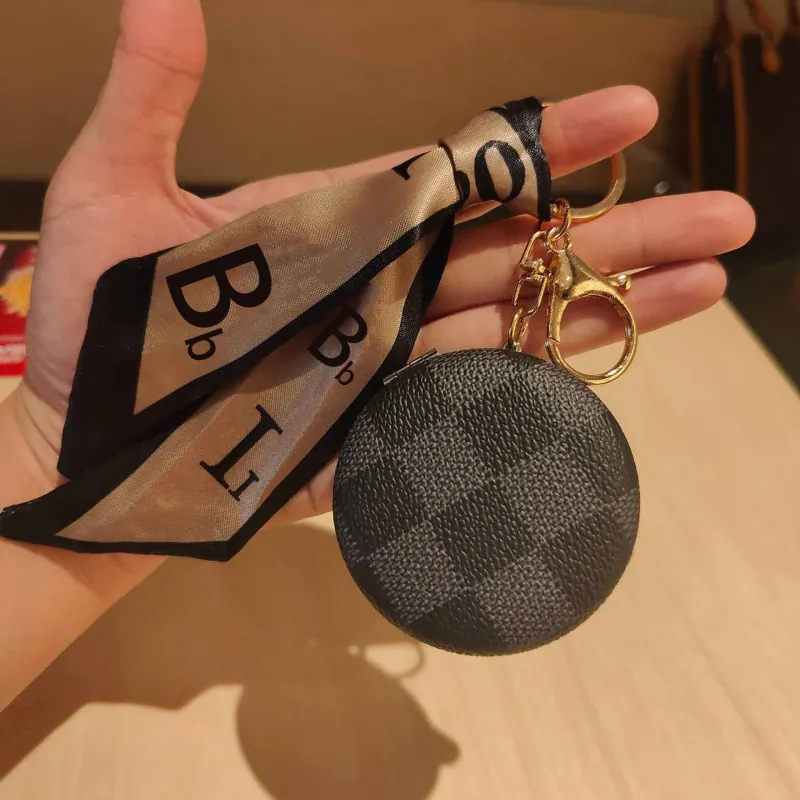 Portachiavi Specchio Da Trucco Portatile Rotondo Con Custodia In Pelle PU E Nastro Di Raso Elegante Ciondolo Per Borsa