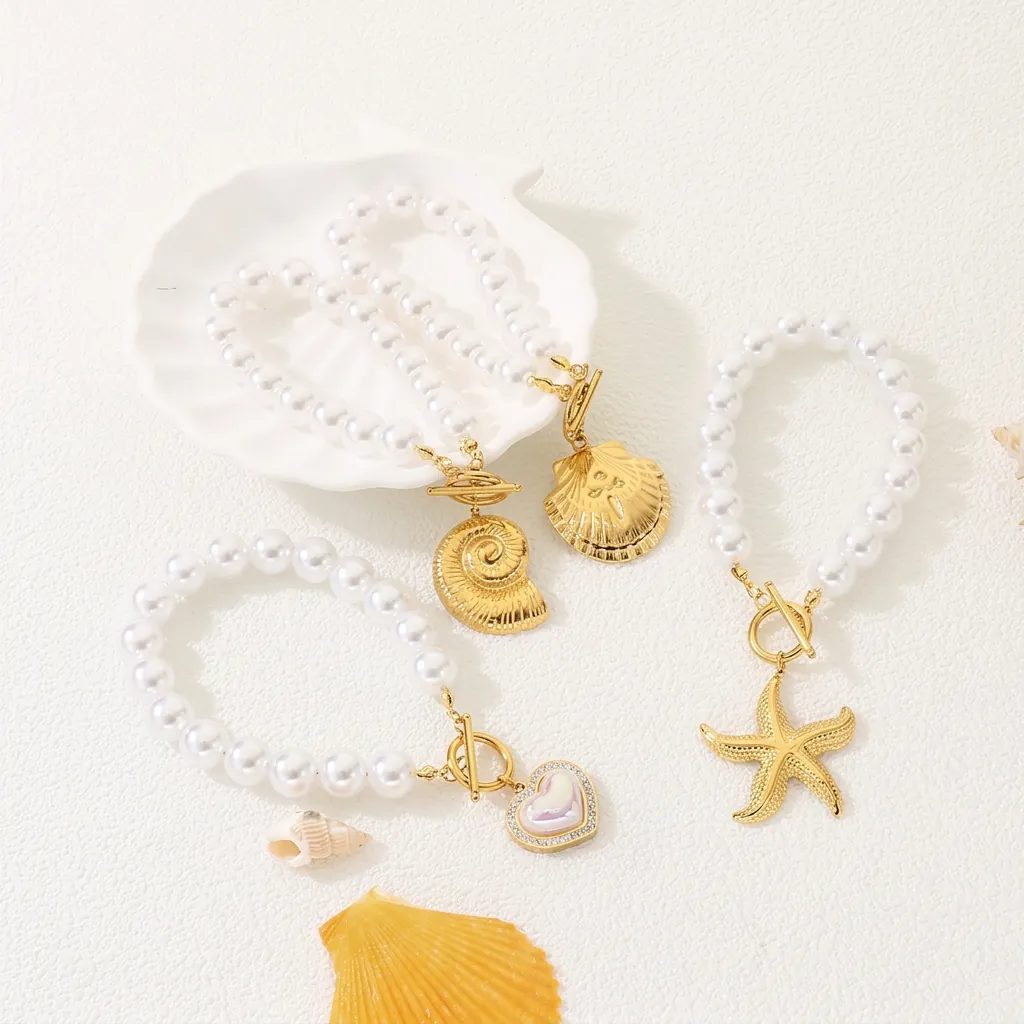 Bracelet Künstliche Perles Élégant Avec Künstliche Perle Imitation Acier Inoxydable Charm Coquillage Étoile De Mer Coeur Fermoir OT Plage Femmes