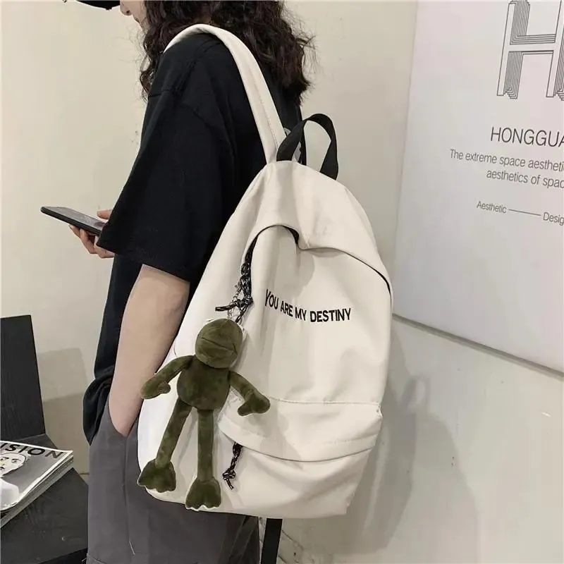 Sac À Dos Décontracté Sac D'école Nylon Léger Imprimé Lettres Style Harajuku Pour Étudiants Avec Pendentif En Peluche
