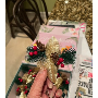 5-star customer review photo by E*****g, image 2 of 2 for Artificial Christmas Pine Needles with Red Berries and Pine Cones