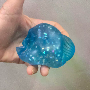 5-star customer review photo by C*****x, image 6 of 6 for Glitter Maltose Duck Squishy Stress Relief Toy