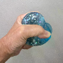 5-star customer review photo by C*****x, image 3 of 6 for Glitter Maltose Duck Squishy Stress Relief Toy