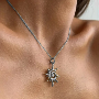 5-star customer review photo by E*****o, image 3 of 10 for Zinc Alloy Gothic Heart Cross Charms For Jewelry Making