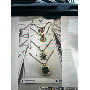 5-star customer review photo by R*****i, image 11 of 17 for Gold Zinc Alloy Keychain With Shell Starfish Pendants