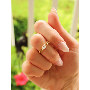 5-star customer review photo by N*****a, image 4 of 4 for Rotating Spinner Clover Flower Copper Ring For Women