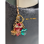 5-star customer review photo by J*****s, image 1 of 1 for Camellia Flower Leather Keychain With Gold Metal Coin Pendant