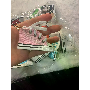 5-star customer review photo by S*****e, image 2 of 4 for Bohemian Cowhide Leather Cow Skull Earrings with Leopard Print